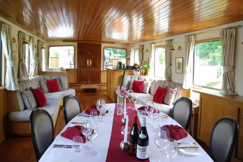 The barge has an elegant dining area